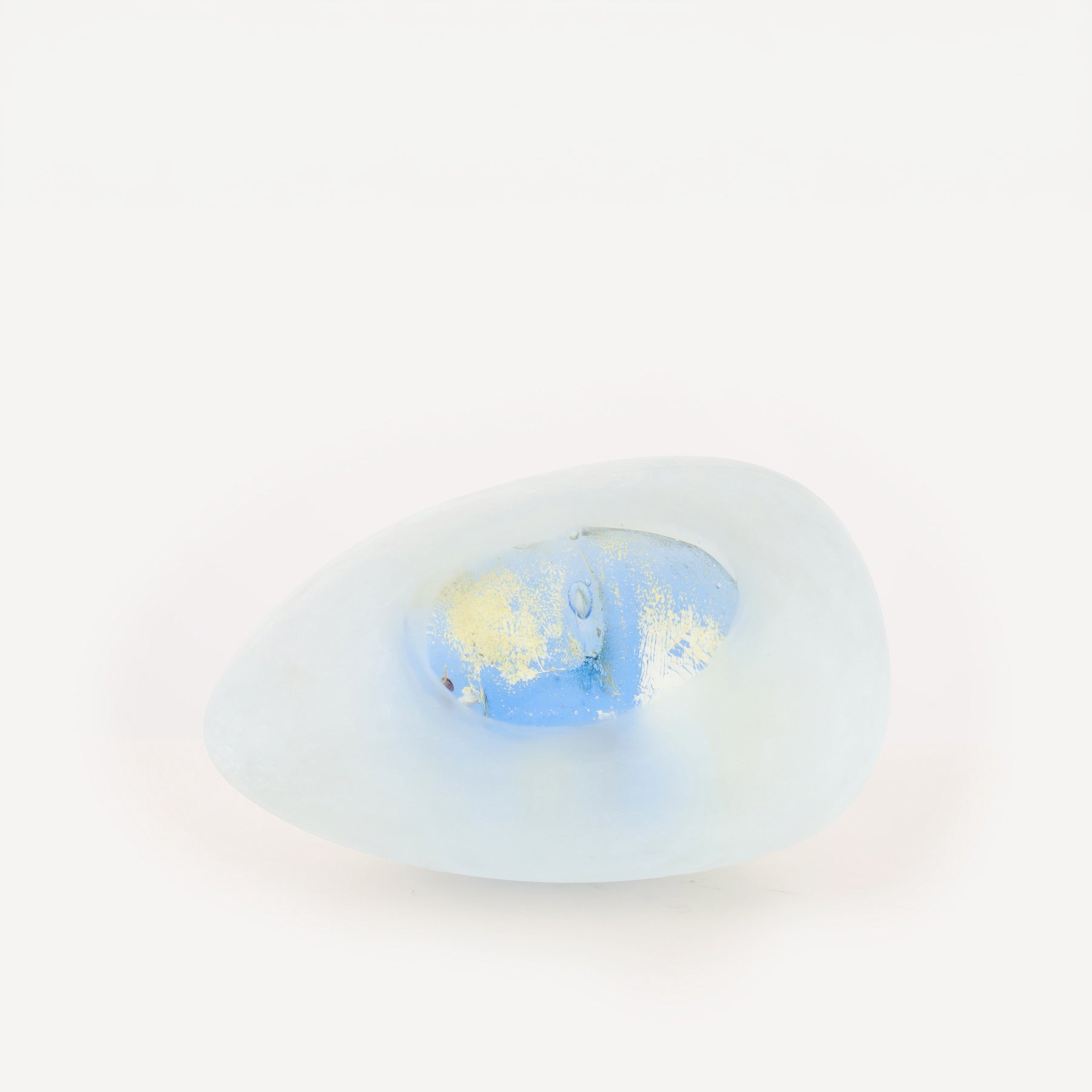 Resting Head 3 Bertil Vallien egg shaped sculpture with blue and yellow face inside on a white background