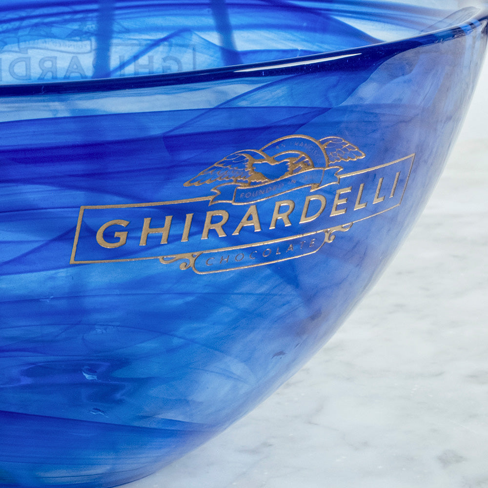 Contrast Bowl Blue on marble surface with gold engraved Ghirardelli logo